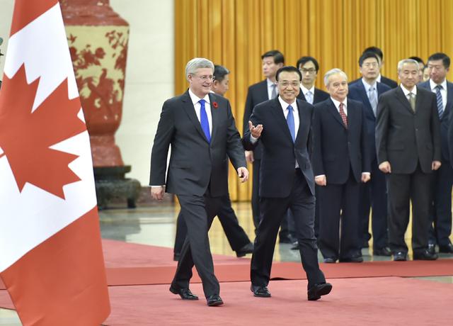 李克强同加拿大总理哈